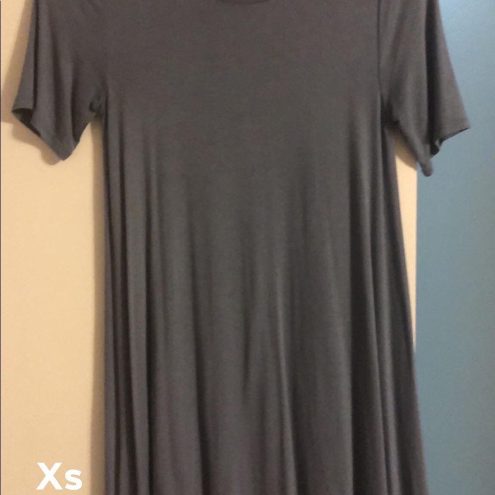 Short sleeve shirt. Longer in length.